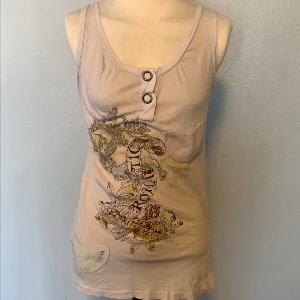 Sleeveless tank with “Romantic” details